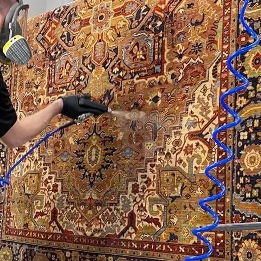 Traitement des taches et odeurs sur un tapis